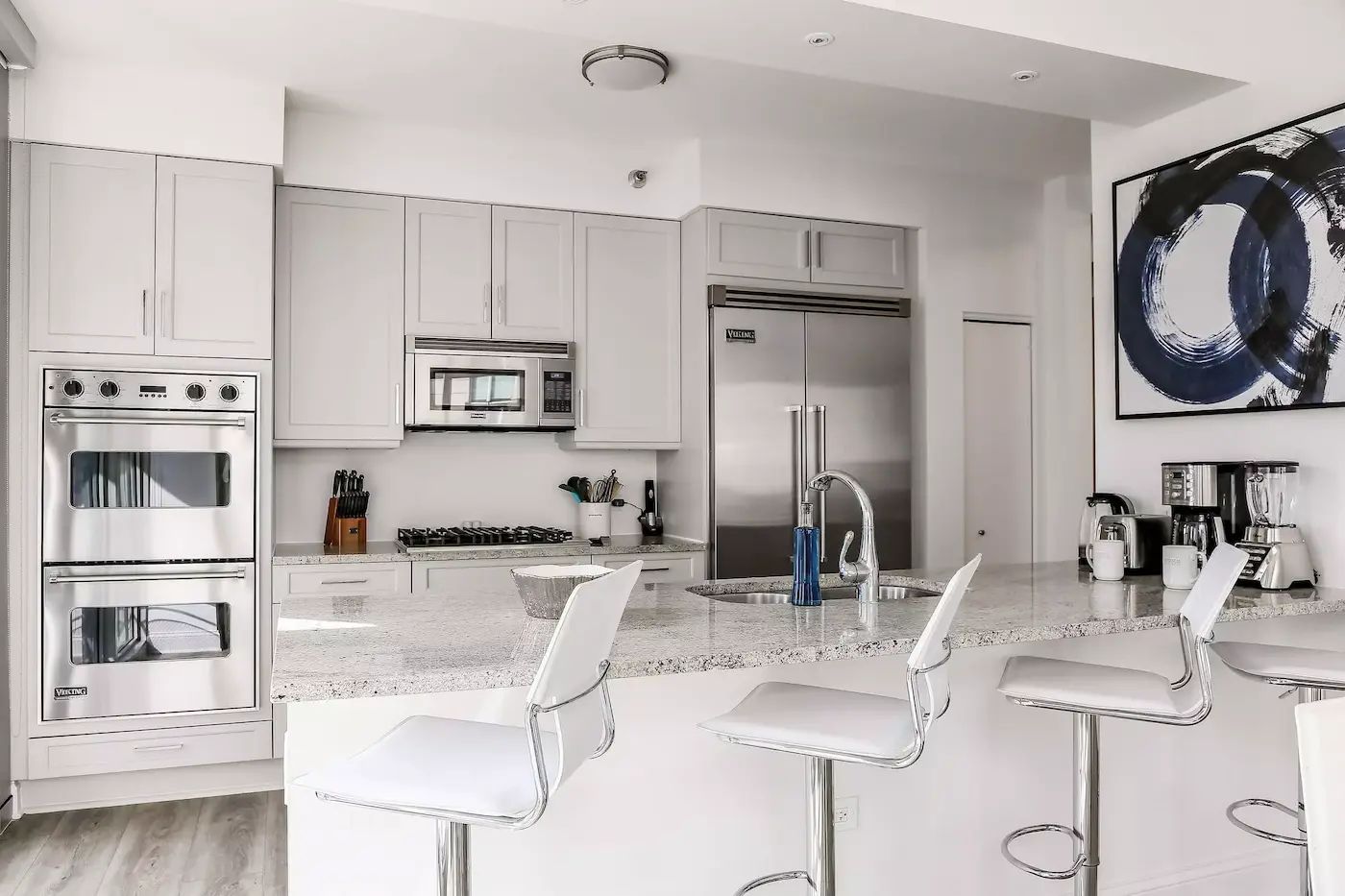 Group of professionals enjoying a luxury furnished corporate apartment in Downtown Chicago.