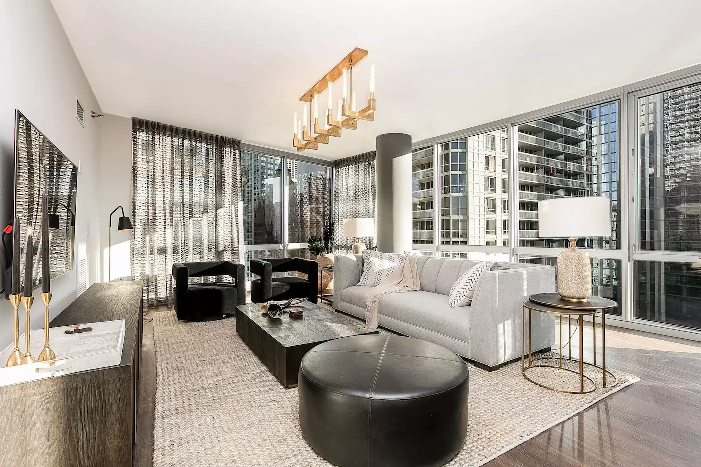 Group of professionals enjoying a luxury furnished corporate apartment in Downtown Chicago.